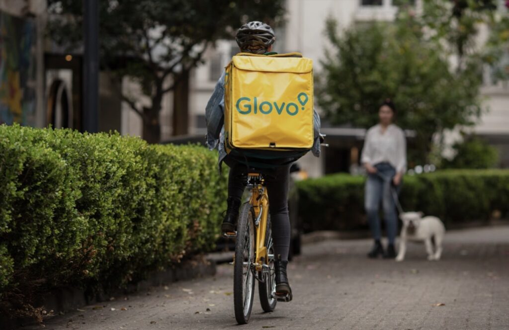 A delivery guy on a bicycle 